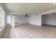 Spacious living room with tile flooring, recessed lighting, and ceiling fan at 4734 S Atlantic Ave, Ponce Inlet, FL 32127