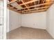 Tiled room with exposed ceiling beams and electrical wiring at 4734 S Atlantic Ave, Ponce Inlet, FL 32127