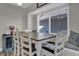 Dining area features a large window, natural light, and comfortable cushioned bench seating at 510 Silvergate Loop, Lake Mary, FL 32746