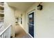 Inviting hallway entrance with a view to the interior; natural light enhances the neutral tones at 525 Marina Point Dr # 5250, Daytona Beach, FL 32114