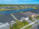 Beautiful aerial view of a lakeside community showcasing well-maintained homes and lush landscaping at 6271 W Fallsgrove Ln, Port Orange, FL 32128