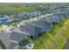 Aerial shot of the neighborhood highlighting backyard spaces, landscaping, and screened patios at 6271 W Fallsgrove Ln, Port Orange, FL 32128
