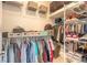 The walk-in closet is well-organized with shelving and hanging rods for ample storage at 6271 W Fallsgrove Ln, Port Orange, FL 32128