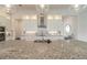 Kitchen with granite countertops, stainless steel appliances, and modern fixtures at 6271 W Fallsgrove Ln, Port Orange, FL 32128