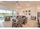 Spacious living room with large windows offering views of the outdoors at 6271 W Fallsgrove Ln, Port Orange, FL 32128