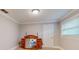 Bedroom with a mirror and window at 7108 East Rd, Lakeland, FL 33809