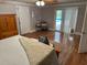 Bedroom with sliding glass doors to pool area at 7108 East Rd, Lakeland, FL 33809