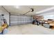 Spacious two car garage with shelving for storage and extra space for projects at 7108 East Rd, Lakeland, FL 33809