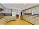 Well-equipped kitchen with modern appliances, granite counters and mosaic backsplash at 7108 East Rd, Lakeland, FL 33809