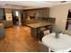Open concept kitchen and dining nook with views to other parts of the home at 7108 East Rd, Lakeland, FL 33809