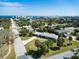 Aerial view of a waterfront community with beautiful blue ocean water and high rise buildings at 72 Rockefeller Dr, Ormond Beach, FL 32176
