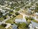Aerial shot of neighborhood, showcasing tree-lined streets and neatly kept homes at 72 Rockefeller Dr, Ormond Beach, FL 32176