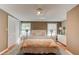 Cozy bedroom with natural light, neutral tones, and hardwood flooring offers a relaxing retreat at 72 Rockefeller Dr, Ormond Beach, FL 32176