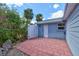 Cozy brick patio area, ideal for outdoor relaxation and entertaining, with a private fenced entry at 72 Rockefeller Dr, Ormond Beach, FL 32176