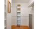 Spacious walk-in closet with built-in shelving and ample storage space for organized living at 72 Rockefeller Dr, Ormond Beach, FL 32176
