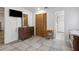 Bedroom with a ceiling fan leading into the ensuite bathroom at 749 Cassadaga Rd, Lake Helen, FL 32744