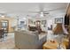 Open-concept living area with comfortable seating and access to the kitchen at 749 Cassadaga Rd, Lake Helen, FL 32744