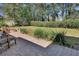 Backyard with patio, landscaping, and firepit at 857 Westchester Dr, Deland, FL 32724