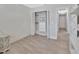 Bright bedroom featuring a closet with shelving, storage, and neutral paint at 857 Westchester Dr, Deland, FL 32724