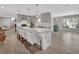 Open kitchen layout with a large center island, stainless appliances, and seating at 857 Westchester Dr, Deland, FL 32724