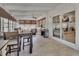 Open sunroom showcasing a dinette set, cozy seating and sliding glass doors to interior at 857 Westchester Dr, Deland, FL 32724