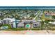 Aerial view of oceanfront condos offering beach access, community pool, parking, and views of the intercoastal waterway at 935 Ocean Shore Blvd # 4010, Ormond Beach, FL 32176