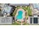 Aerial view of oceanfront condos offering beach access, community pool, manicured lawns, and patio seating at 935 Ocean Shore Blvd # 4010, Ormond Beach, FL 32176