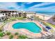 Enjoy this kidney shaped swimming pool surrounded by lounge chairs and manicured landscaping and beach views at 935 Ocean Shore Blvd # 4010, Ormond Beach, FL 32176