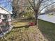 Large backyard featuring a swing and a partial view of trampoline at 1031 Tony Cir, St Cloud, FL 34772