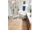 Well-lit bathroom with tiled floors, separate shower, garden tub and a vanity with plenty of storage space at 1031 Tony Cir, St Cloud, FL 34772