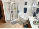 Bright bathroom with walk-in shower, soaking tub, and vanity with sink at 1031 Tony Cir, St Cloud, FL 34772