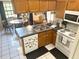 Efficiently designed kitchen features ample counter space and plenty of storage space at 1031 Tony Cir, St Cloud, FL 34772