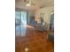 Inviting living room boasts tile floors and sliding glass doors to the outdoor living area at 1031 Tony Cir, St Cloud, FL 34772