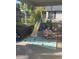 Enclosed porch with playground, offering a versatile outdoor play area and relaxing space at 1031 Tony Cir, St Cloud, FL 34772