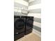 Laundry room showcasing modern Samsung washer and dryer units at 1077 Chelan Falls N Trl, Deland, FL 32724