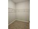 An empty walk-in closet with wire shelving for storage and organization at 1077 Chelan Falls N Trl, Deland, FL 32724