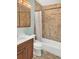 This bathroom features a single sink vanity, and a tub with a shower at 1118 Meditation Loop, Port Orange, FL 32129