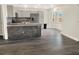 Modern kitchen with stainless steel appliances, breakfast bar, and stylish backsplash at 1118 Meditation Loop, Port Orange, FL 32129