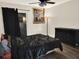 Cozy bedroom with wood floors, natural light and a modern ceiling fan at 1118 Meditation Loop, Port Orange, FL 32129