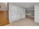 Entryway featuring tile floors, staircase, and multiple entry doors at 116 Moonstone Ct, Port Orange, FL 32129