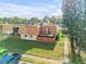 Exterior home elevation featuring a grassy yard and two-story layout at 116 Moonstone Ct, Port Orange, FL 32129