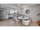 Bright kitchen with stainless steel appliances and an adjacent dining area at 116 Moonstone Ct, Port Orange, FL 32129