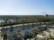 Scenic aerial view of a waterside neighborhood featuring mature trees and close proximity to Advent Health at 1204 Draycott St, Ormond Beach, FL 32174