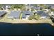 Beautiful lakefront property with a spacious backyard and a charming two-story home with a balcony at 1204 Draycott St, Ormond Beach, FL 32174