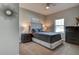 Cozy bedroom featuring a plush bed, decorative wall art, and neutral tones at 1204 Draycott St, Ormond Beach, FL 32174