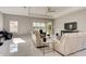 Cozy living room with neutral walls, a ceiling fan, recessed lighting, and ample seating at 1204 Draycott St, Ormond Beach, FL 32174