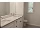 Bright bathroom features a double vanity with white countertops and modern fixtures at 1275 16Th St, Orange City, FL 32763