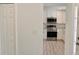 View of modern kitchen boasting white cabinets and stainless steel appliances at 1275 16Th St, Orange City, FL 32763