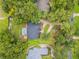 Aerial view showcasing the home's private backyard, pool, and mature landscaping at 1500 Wyngate Dr, Deland, FL 32724