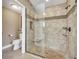 Spacious bathroom with a large tiled shower and a built-in bench at 1500 Wyngate Dr, Deland, FL 32724